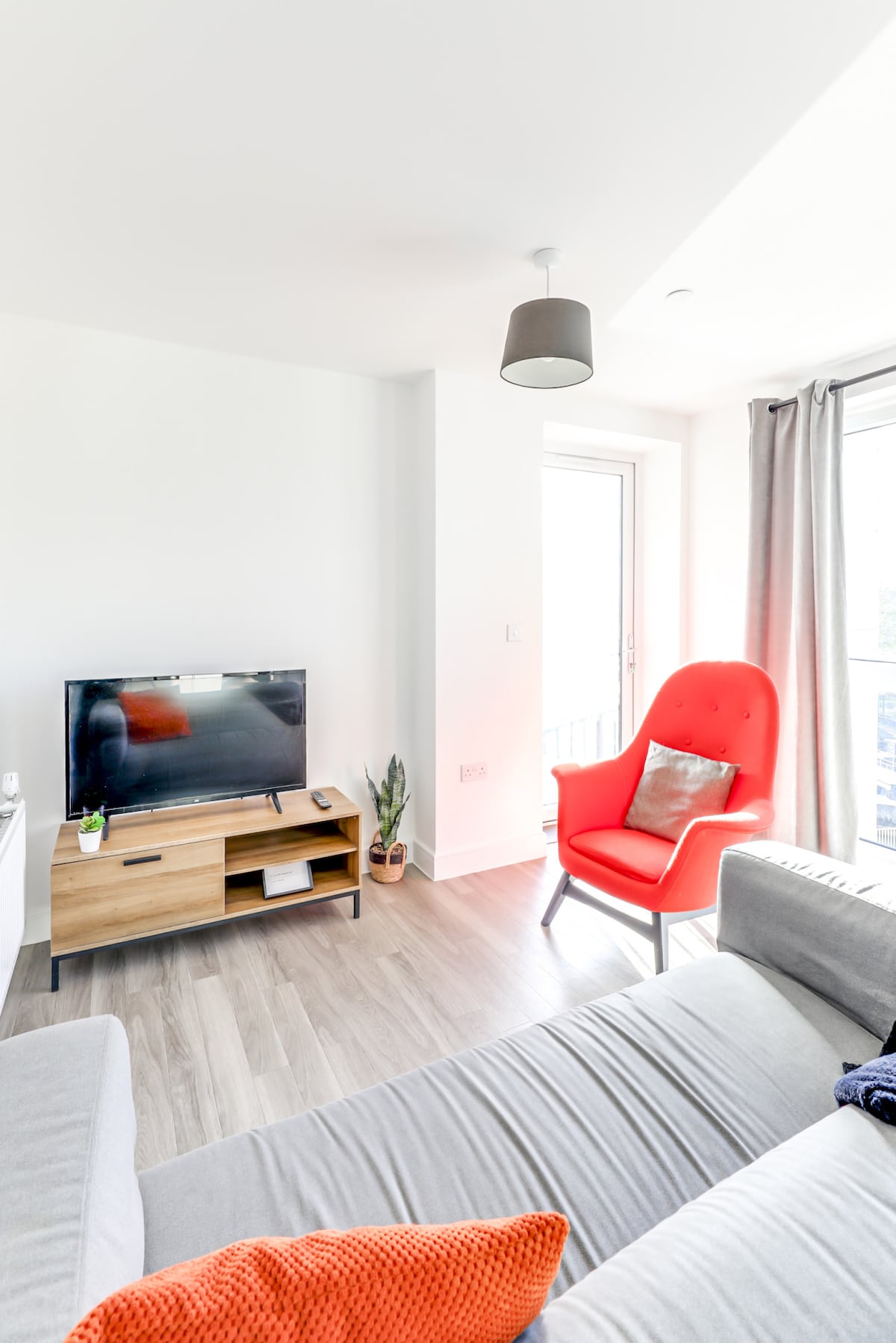 Chelmsford city centre apartment bright living room with balcony access