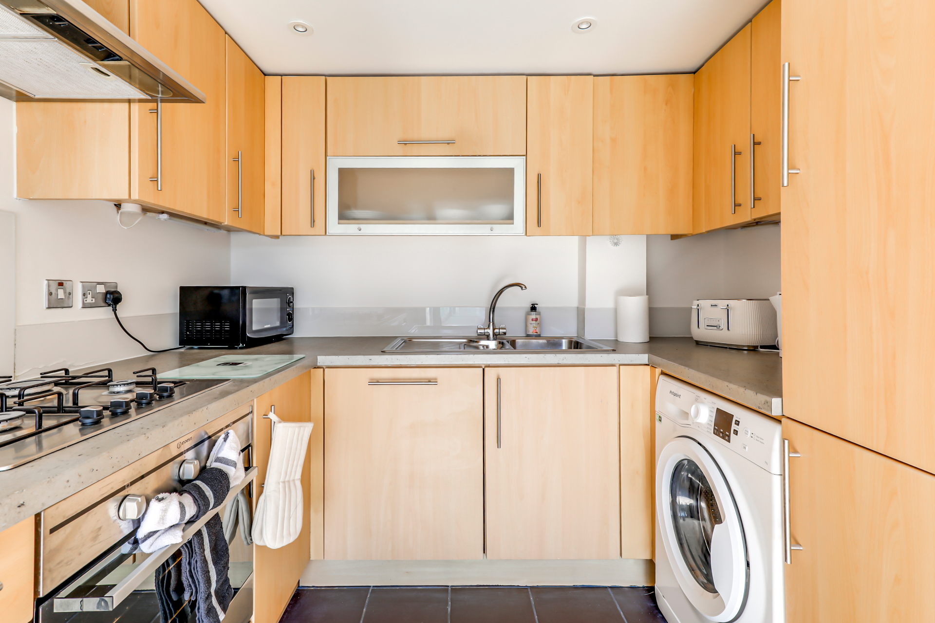 Fully equipped kitchen with washer dryer in Chelmsford apartment