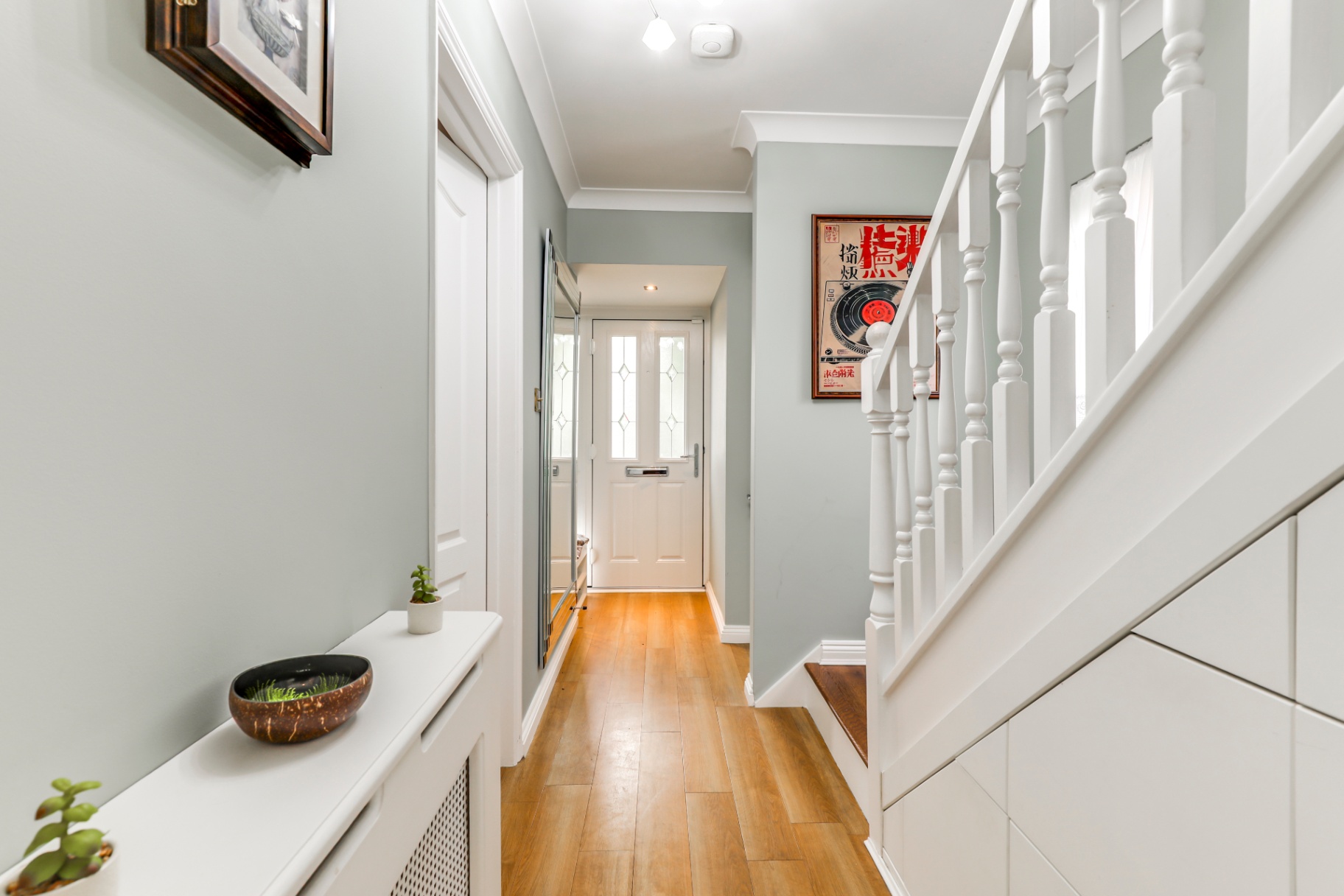 Bright entrance hallway of Wickford 4-bed house