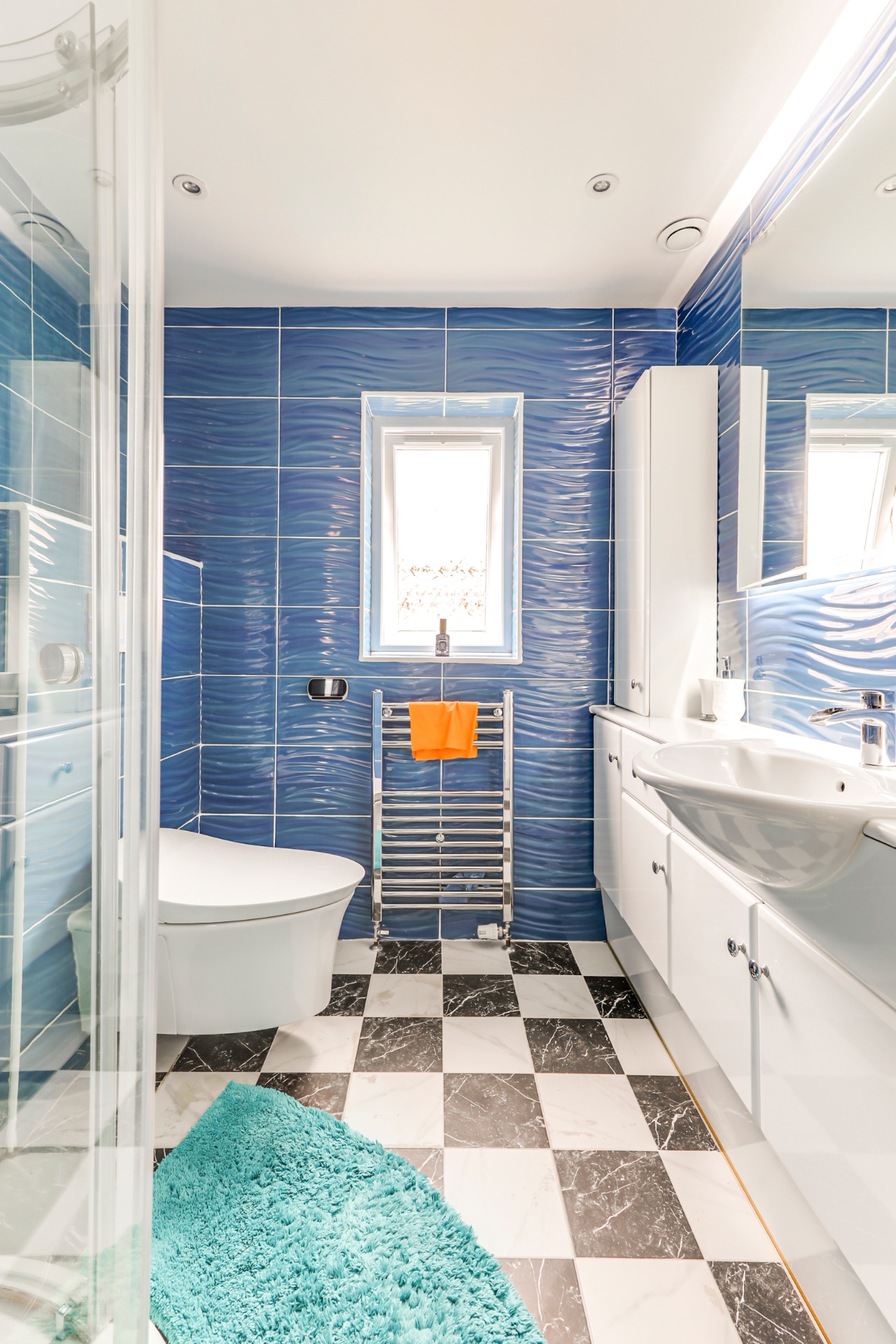 Modern bathroom with walk-in shower in Wickford house